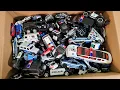 Box Full Of Police Car Diecast Cars Large collection of police diecast cars from different countries