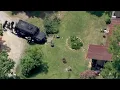 Armed suspect barricaded inside home