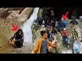 Download Lagu Rock climbing of Akram and his children in a large waterfall