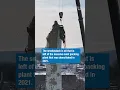 Crews demolish former Tobin s First Prize smokestack