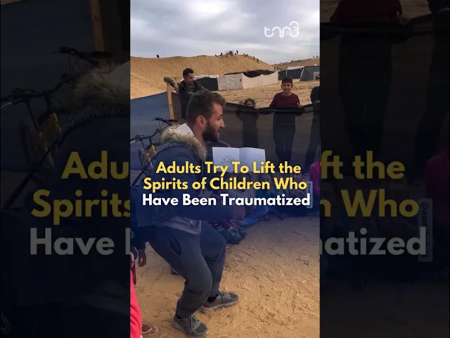 ⁣Adults are seen cheering up children who have been traumatized due to the ongoing Israeli strikes.