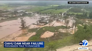 Thousands told to evacuate O ahu in Hawaii with dam near failure