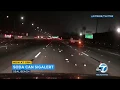 Soda cans on 405 in Seal Beach create bumpy road for drivers I ABC7