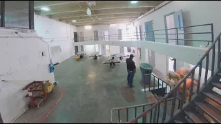 Newly Released Show NMCD Guards Looking on as Person in Custody Is Assaulted