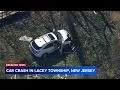 Car crashes through backyard fence in Lacey Township NJ
