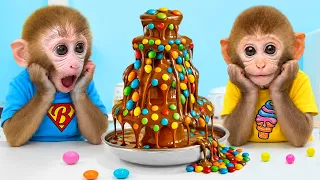 Monkey Baby Bon Bon makes a giant colorful chocolate candy tower with his friend