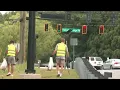 Recent Roswell graduates pick up trash along roadway