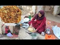 Download Lagu A quiet life of a mother and daughter in the heart of the mountains, preparing traditional bread.
