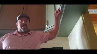 How to cover the unfinished area under my cabinets