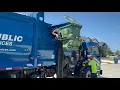 Republic Services Peterbilt 520 McNeilus ZR Side Loader Garbage Truck Packing Out on Recycling