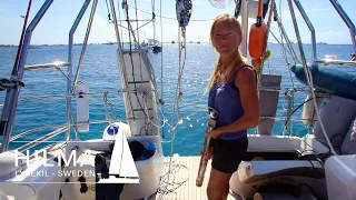 Installing the rudder and changing propeller shaft sealing in the water.  Ep. 47 Hilma Sailing