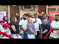 Co-founders of Ori s Cheesesteaks in Chatham speak at ribbon cutting