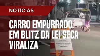 Carro empurrado em blitz da Lei Seca viraliza; 'jeitinho' evita bafômetro?