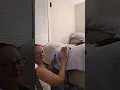 Tickling his feet before and after using baby oil