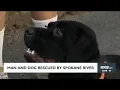 Man and dog rescued by Spokane River