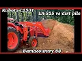 Kubota L2501 moving dirt pile with LA 525 FEL