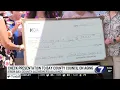 Bay County Alzheimer s Alliance presents large check donation to Bay County Council on Aging