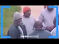 Diddy seen smiling in first prison photos Banfield