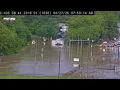 Heavy rain floods 23rd Street near storage caves off I-435