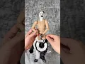WHATS UNDER ART THE CLOWNS SUIT