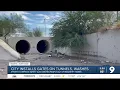 Locked out of the washes Tucson installs metal gates as unhoused residents seek shelter