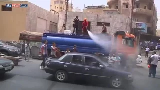 رش الماء في شوارع الاردن من شده الحراره دندنها