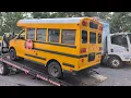2002 GMC Corbeil School Bus coming off Tow Truck