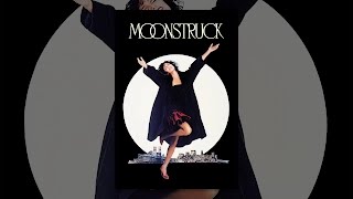 Cher as Loretta Castorini, talking seriously to Nicolas Cage as Ronny Cammareri in the Moonstruck game.