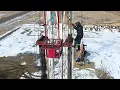 Independent Well Servicing - service rig running rods and tubing in the Bakken at Stoughton Sask