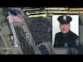 Hundreds attend wake for Officer Paul Tracey