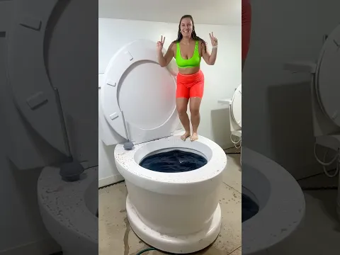 SUPER HIGH JUMP into Worlds Largest Toilet Black Pool in SlowMotionBIGSPLASH#shorts