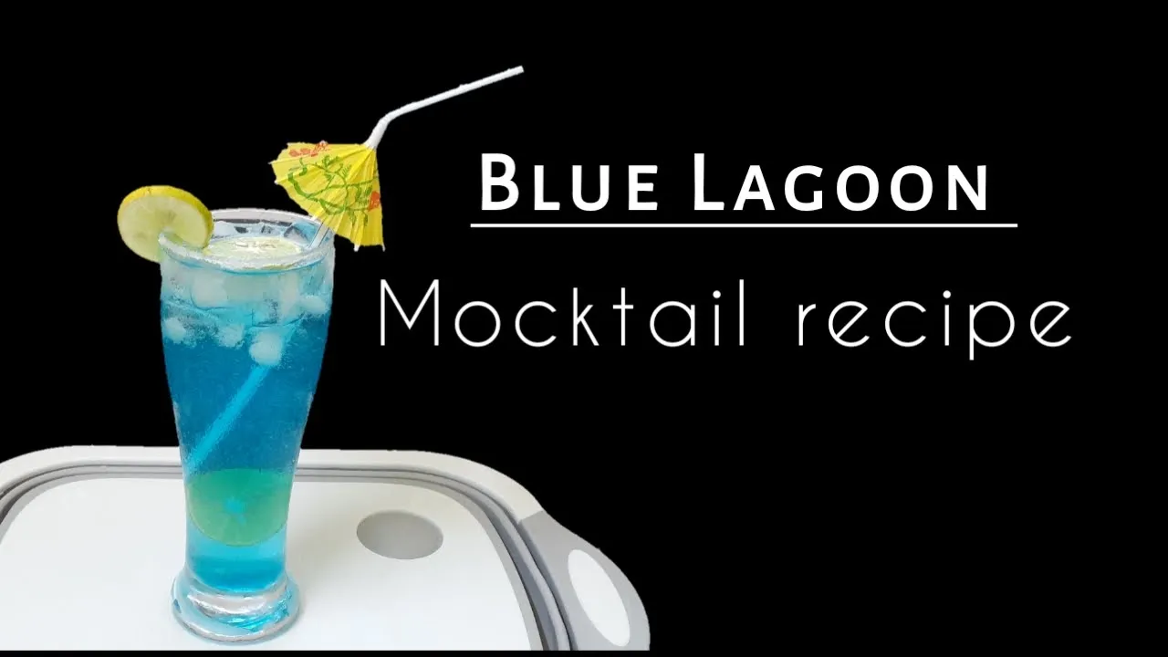 Blue Lagoon Mocktail Recipe | Blue Curacao Lemonade Mocktail by Neeldiya