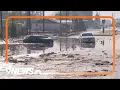 Hail heavy rain floods streets in Greeley