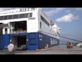 Download Lagu BlueStar Ferry docking in Port Rhodos in stormy weather with rope demolition