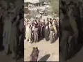 Lagu Huge crowd gathers as Taliban force boy to execute family’s killer in Afghanistan #afghanistan