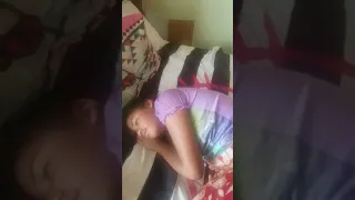 Waking up the birt ay girl by tickling her feet