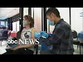 Americans rushing to get booster shots at start of holiday season l GMA