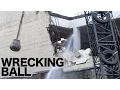 Download Lagu Wrecking ball in action demolishing a concrete building