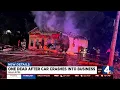 One dead after car crash into Gallatin business