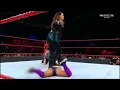 Nia Jax stands on Dana Brooke
