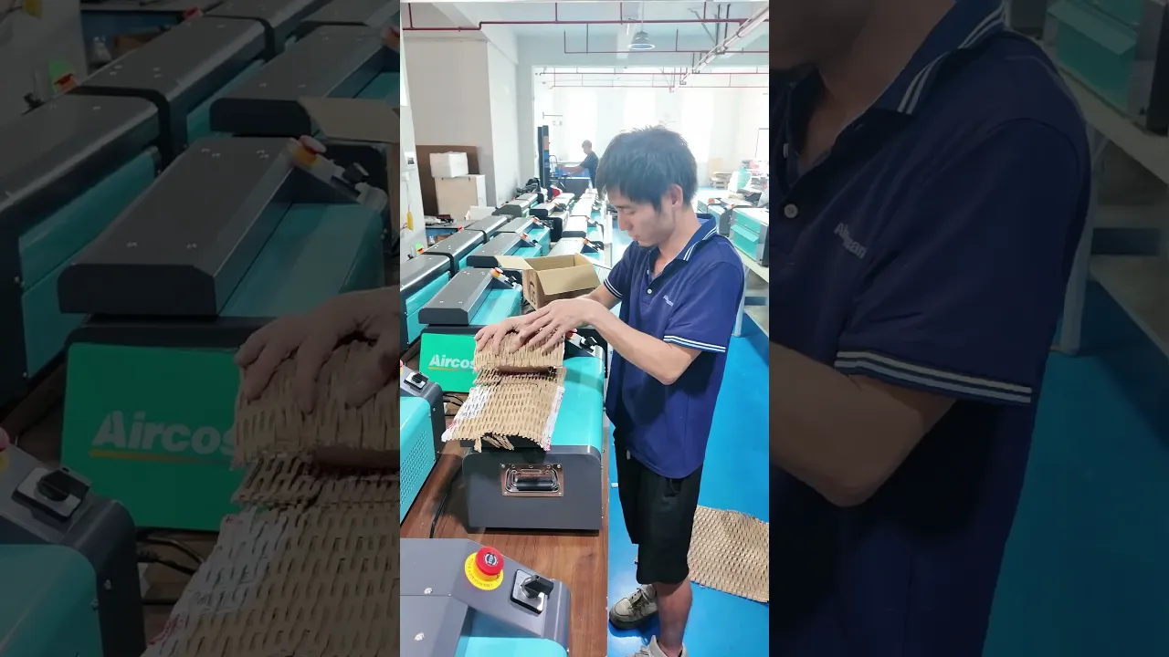 Cardboard expansion machine turns waste cartons into fluffy mesh cushion paper.