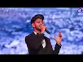 EXCLUSIVE - Ayman Amin sings for two lovers separated by fate, and what about his relationship wi...