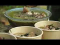 Pork knuckle stewed in a giant bamboo tube – A traditional wood-fired cooking method