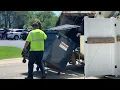 Casella waste White McNeilus RL emptying hotel dumpsters