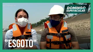 Carolina Ferraz navega pelas águas do rio Tietê