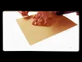 Tattoo flash drawing lining a sheet