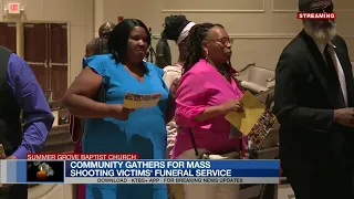 Community gathers for mass shooting victims funeral service