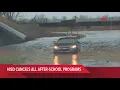 Car stuck in high water in Katy during severe weather