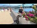 Download Lagu 4k Granate Travelling as tourist sightseeing Argostolion, #Kefallonia, Greece, miniskirt, high heels