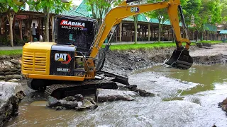 Ripping Heavy Concrete Dam Wall Removal Using CAT Mini Excavator Teeth!